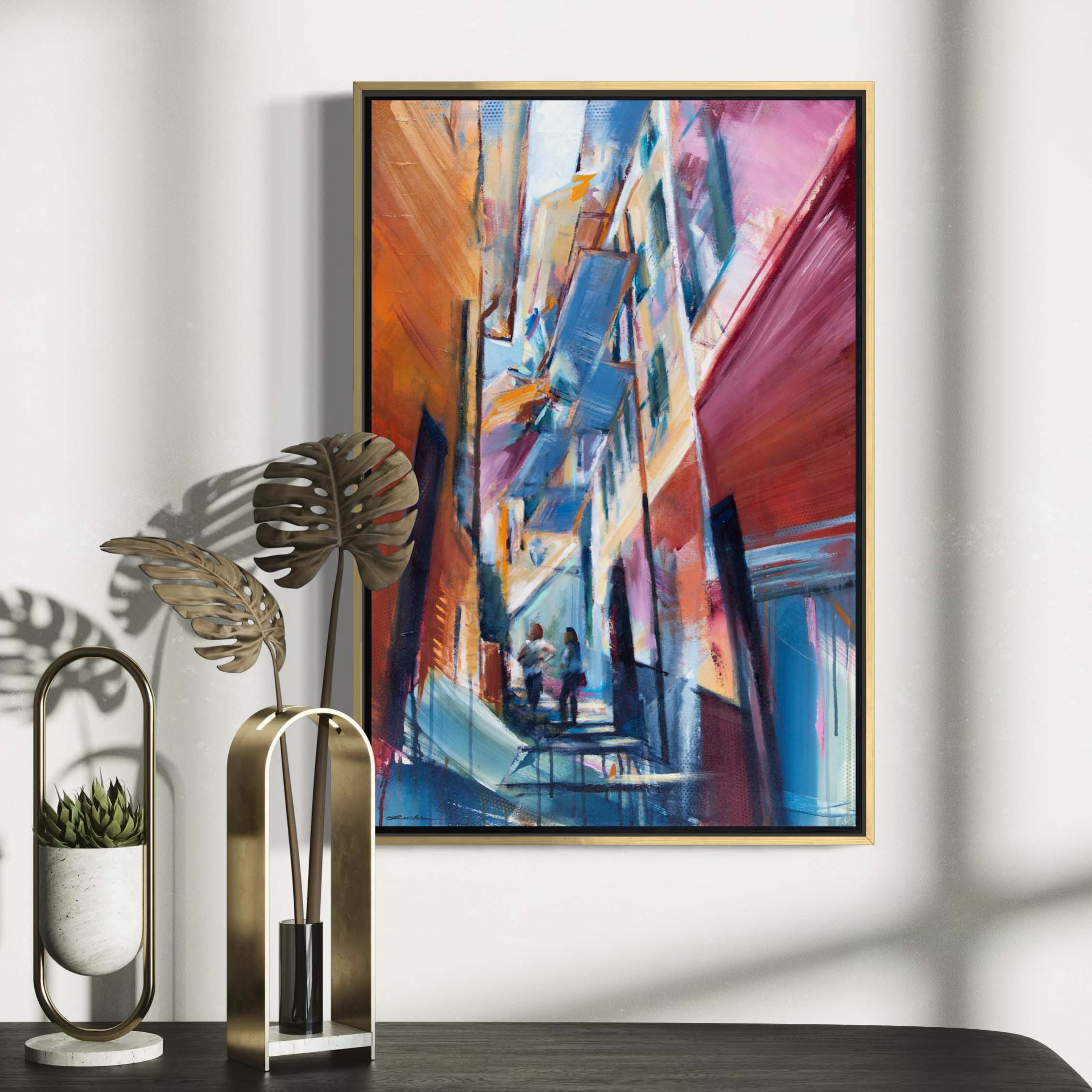 Women climbing Florence staircase by Kyle Lucks on a gallery-wrapped canvas in a gold float frame, front view