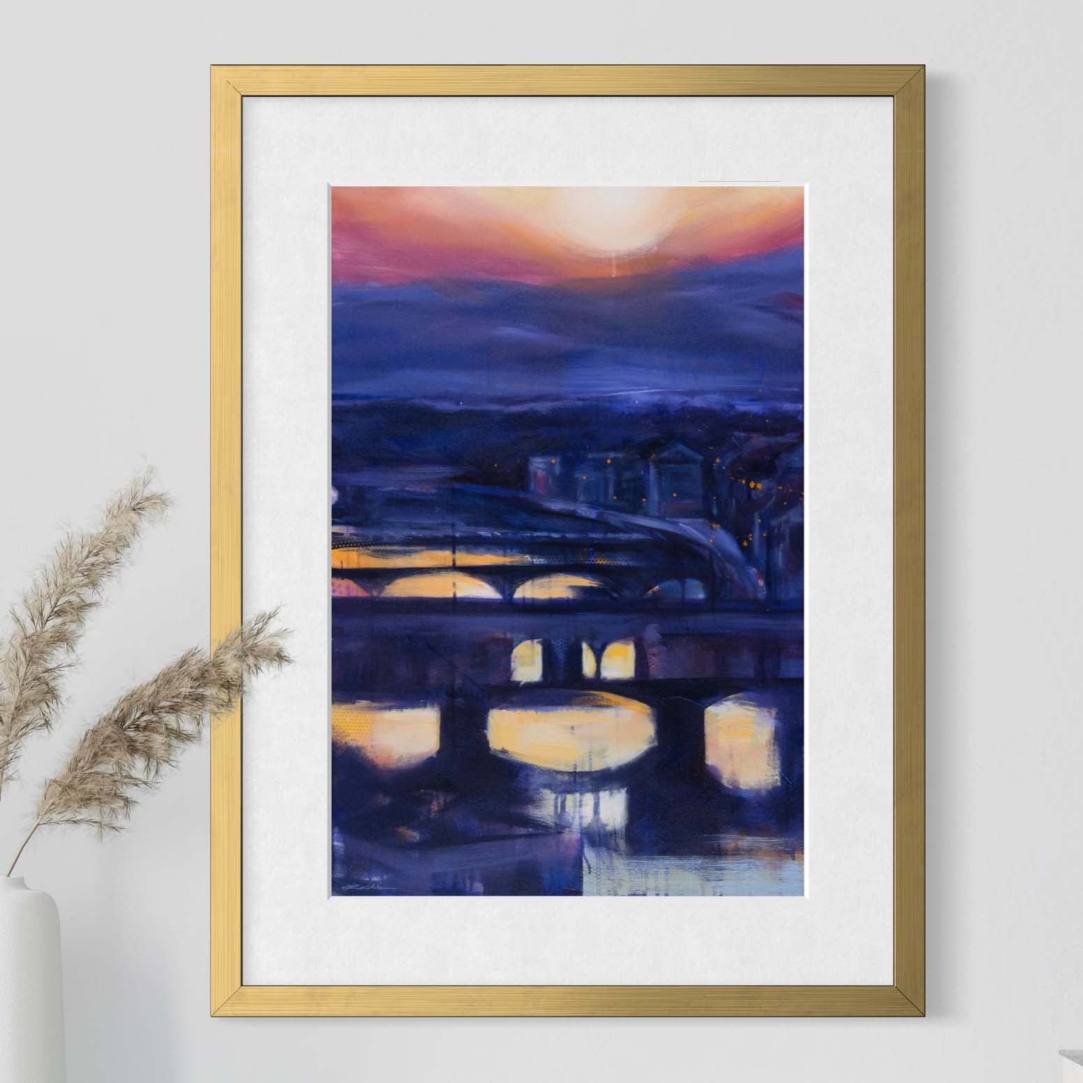 Florence's Arno River at sunset by Kyle Lucks as a framed giclée fine art print in a gold frame, front view