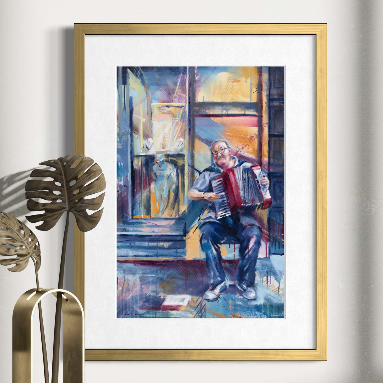 Tuscan street musician playing accordion by Kyle Lucks as a framed giclée fine art print in a gold frame, front view