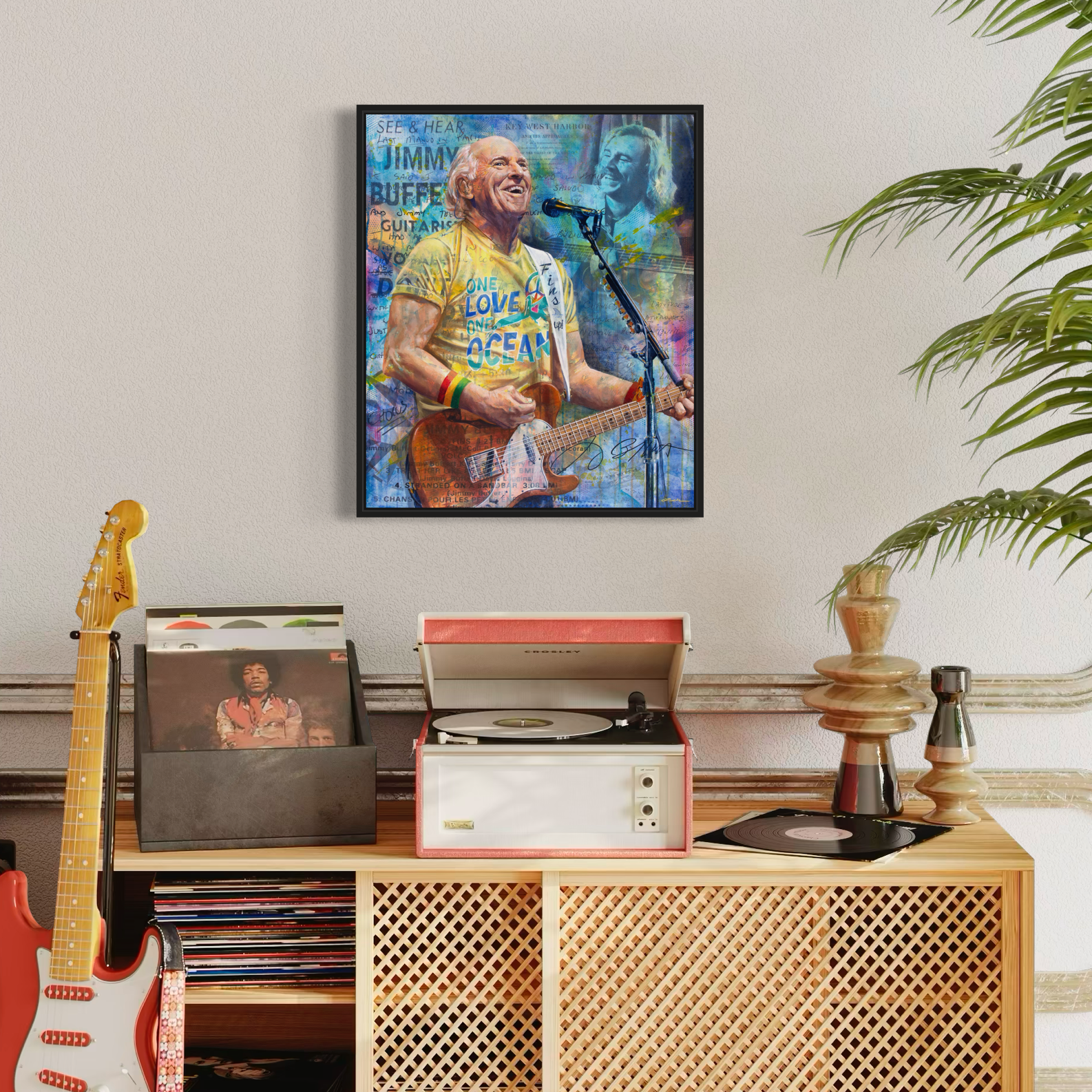 Portrait painting of singer-songwriter Jimmy Buffett playing an orange guitar, wearing a yellow t-shirt and singing into a microphone. Images of Jimmy's handwritten song lyrics in the background.