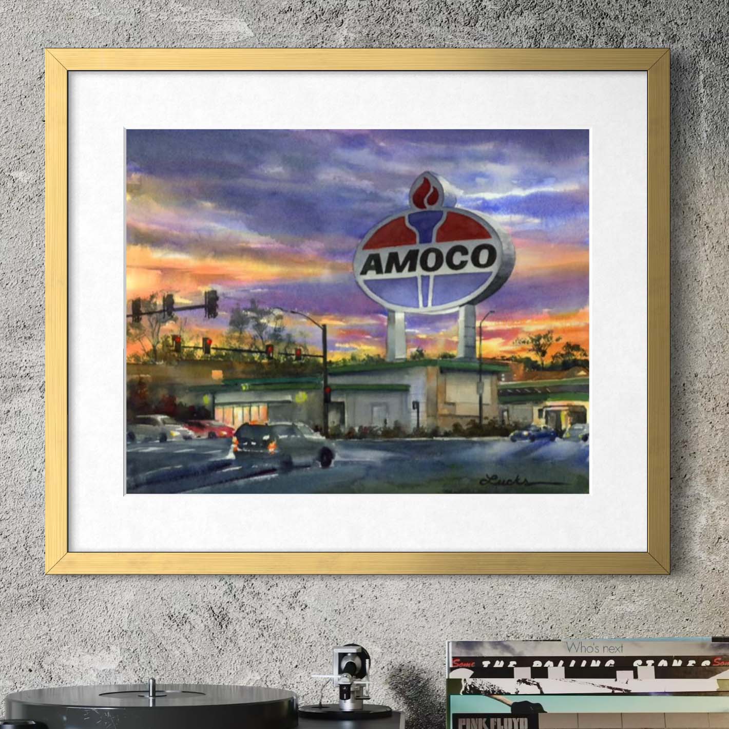 World's largest Amoco sign in St. Louis at sunset by Kyle Lucks as a framed giclée fine art print in a gold frame, front view