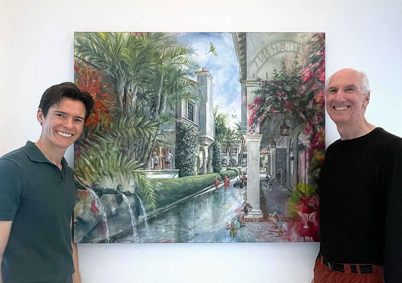 Kyle Lucks with commission client Dave Frisbie beside a custom Palm Beach streetscape painting