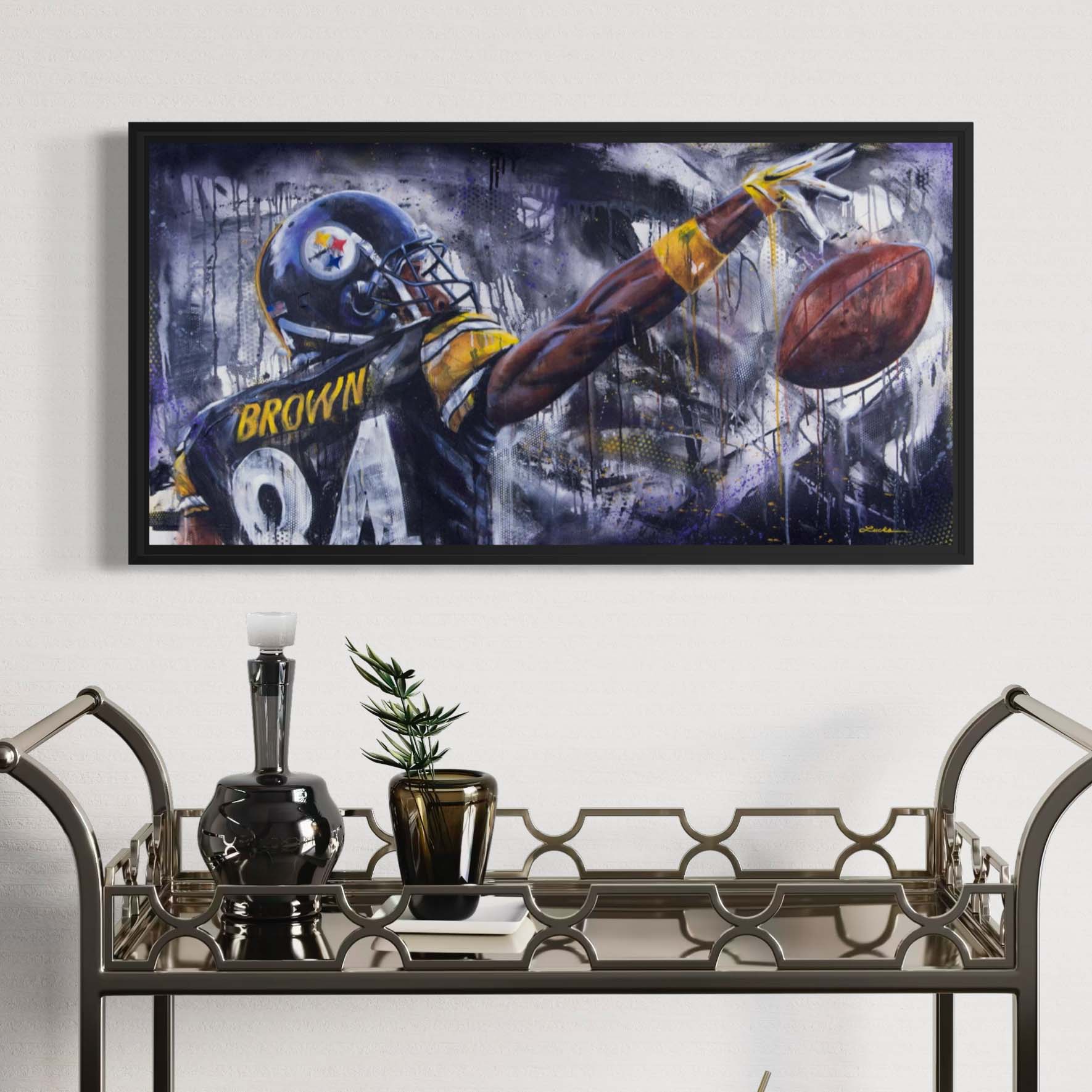 Steelers wide receiver Antonio Brown reaching for the ball by Kyle Lucks on a gallery-wrapped canvas in a black float frame, front view
