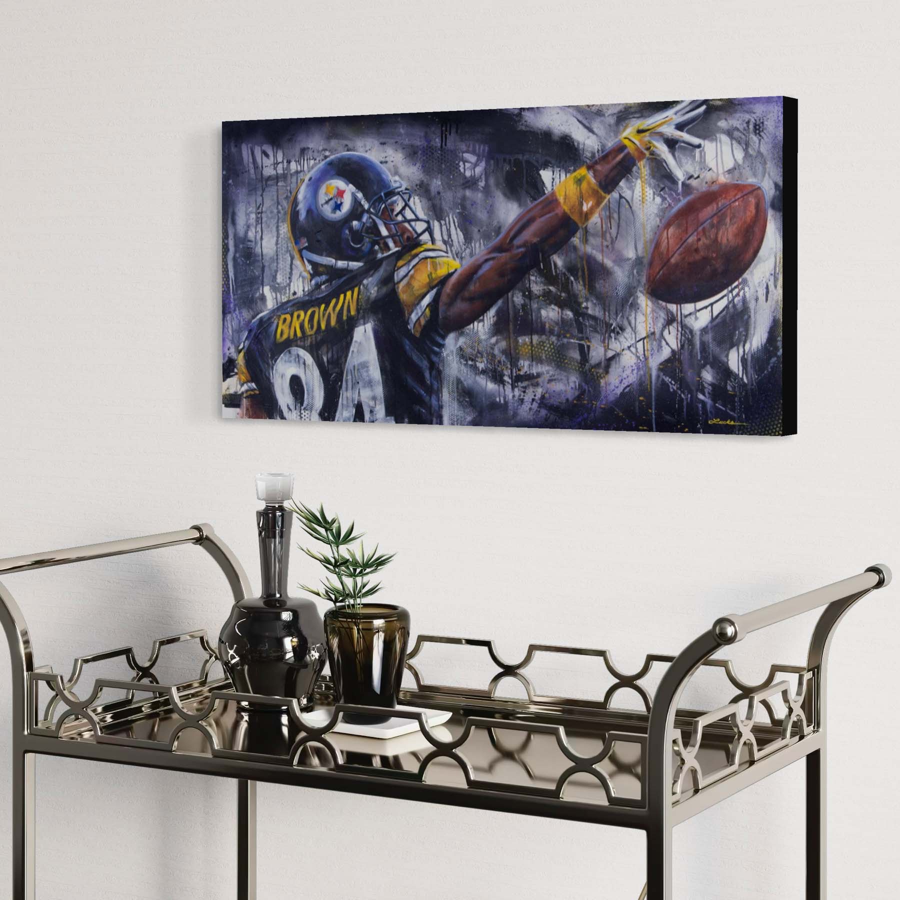 Steelers wide receiver Antonio Brown reaching for the ball by Kyle Lucks on a gallery-wrapped canvas in a black float frame, angle view