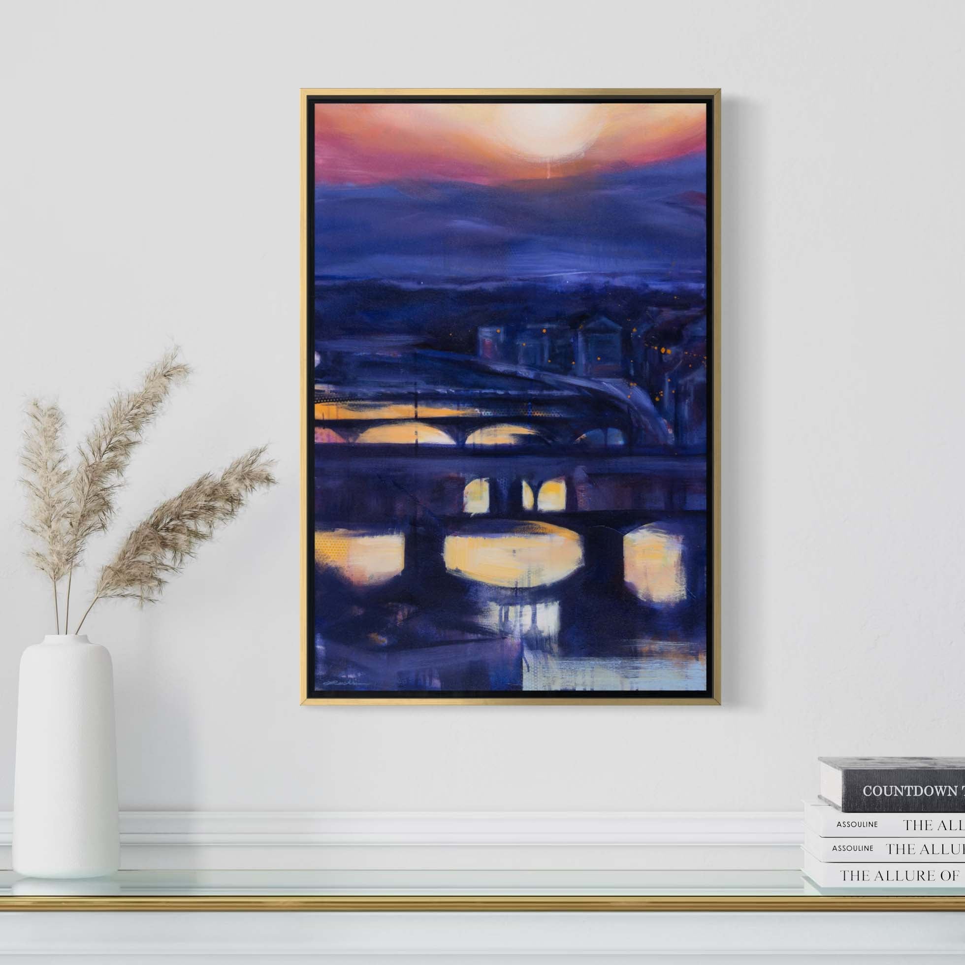Florence's Arno River at sunset by Kyle Lucks on a gallery-wrapped canvas in a gold float frame, front view