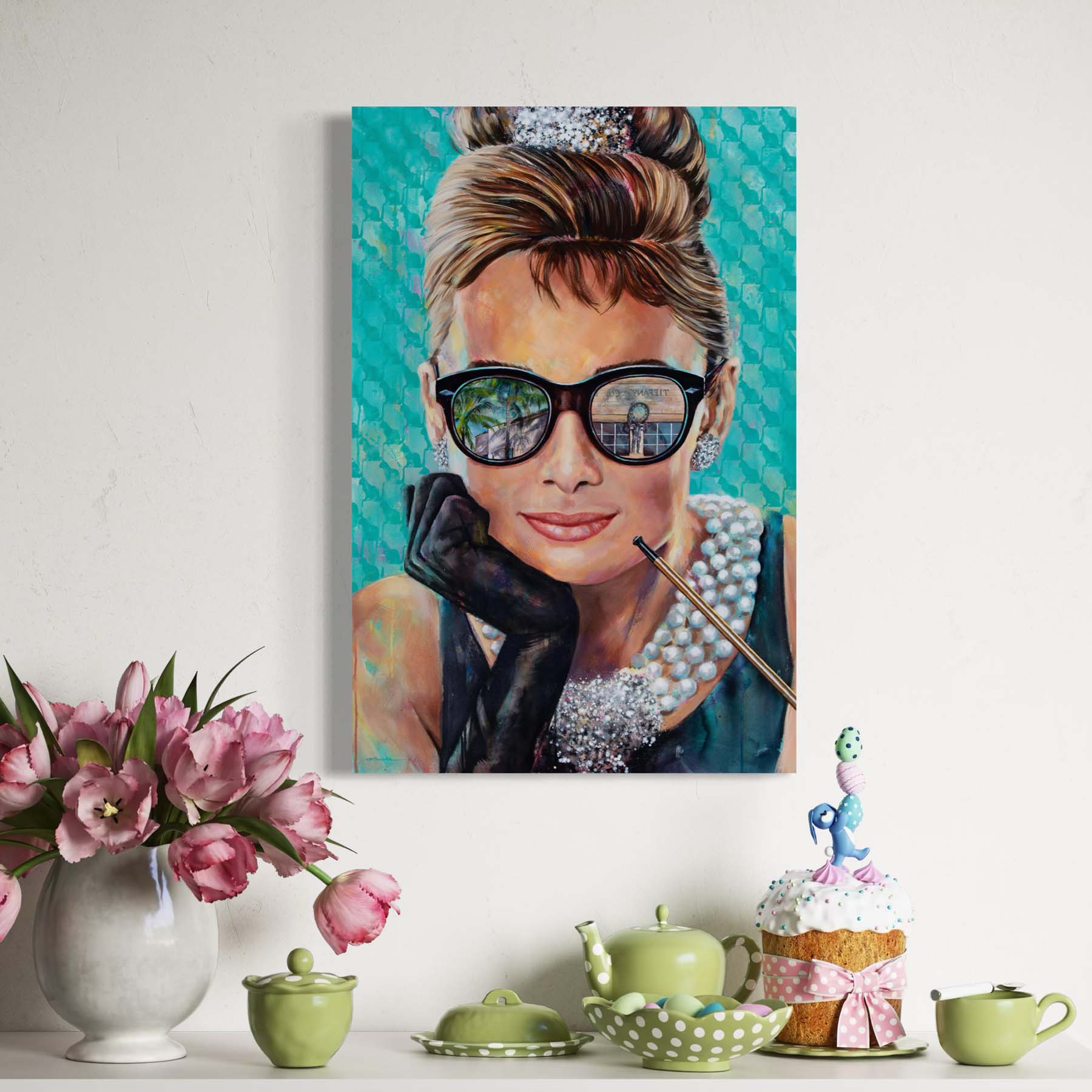 Painted portrait of Audrey Hepburn wearing a pearl necklace and oversized sunglasses with the reflection of the Tiffany & Co. store on Worth Avenue in Palm Beach, Florida. 