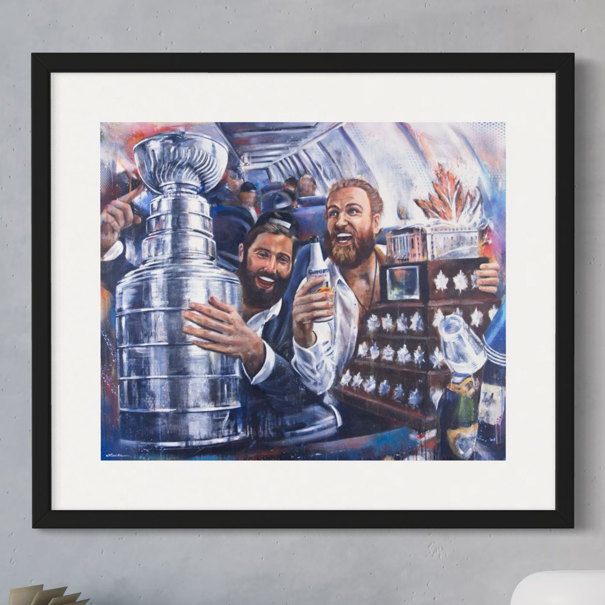 Blues players Maroon and O'Reilly with Cup by Kyle Lucks as a framed giclée fine art print in a black frame, front view