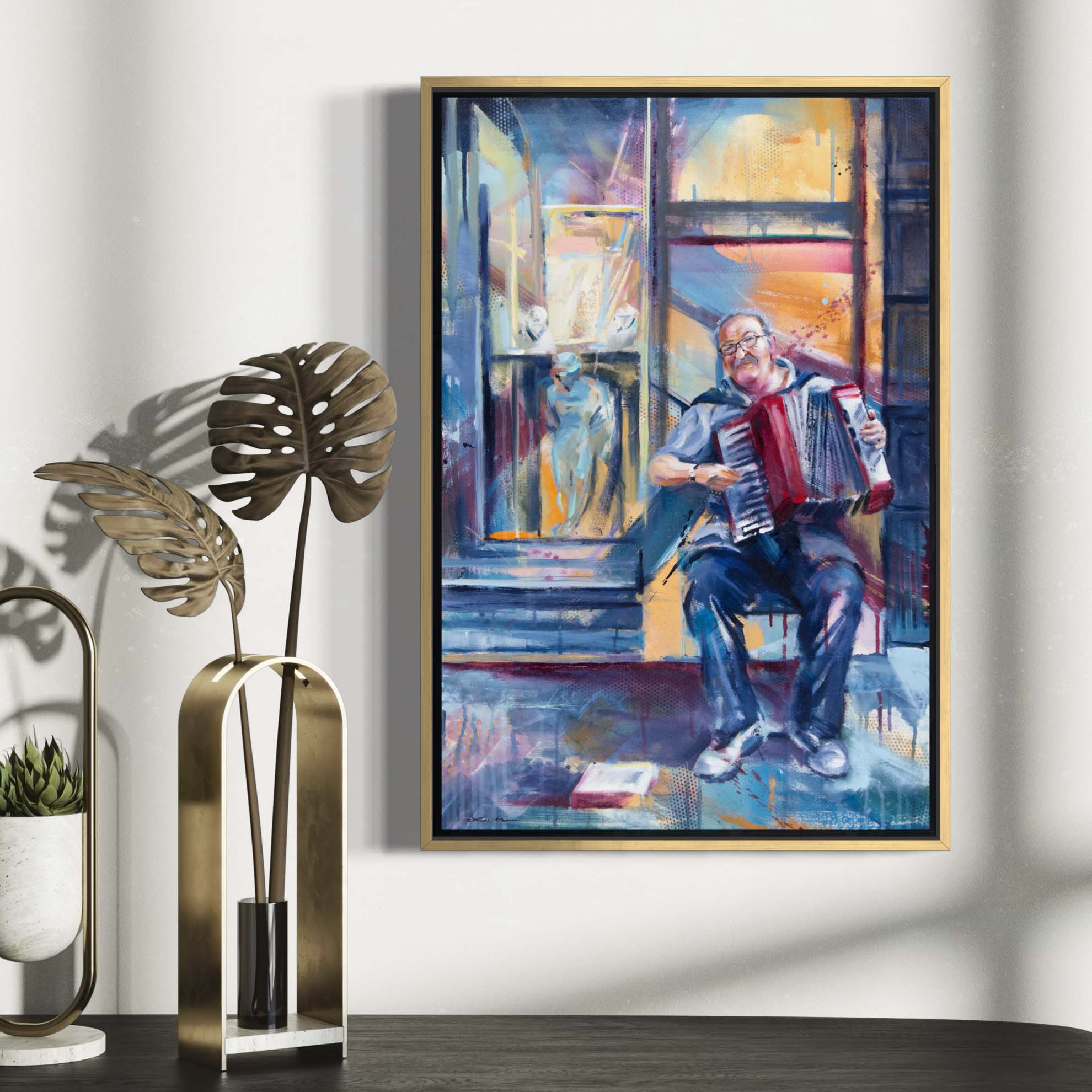 Tuscan street musician playing accordion by Kyle Lucks on a gallery-wrapped canvas in a gold float frame, front view
