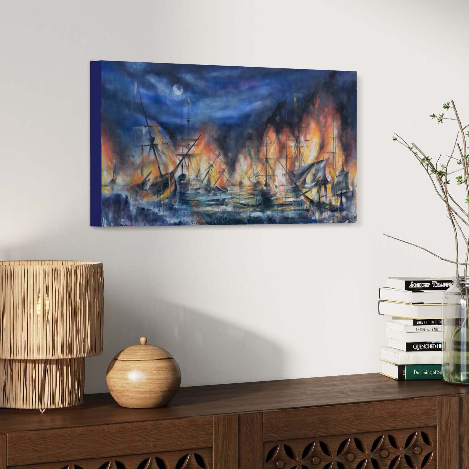 Painting of bright orange flames coming off of boats burning in the ocean under the dark blue night sky and glowing moon