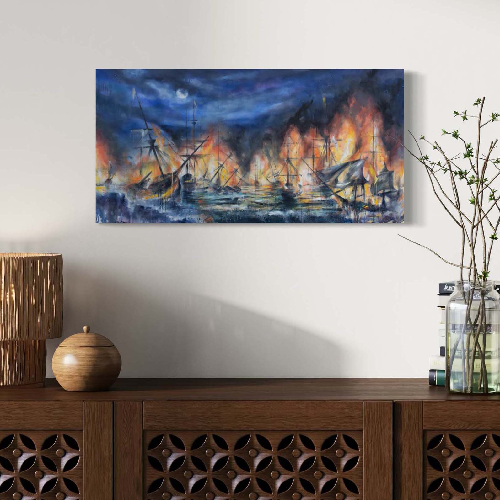 Painting of bright orange flames coming off of boats burning in the ocean under the dark blue night sky and glowing moon