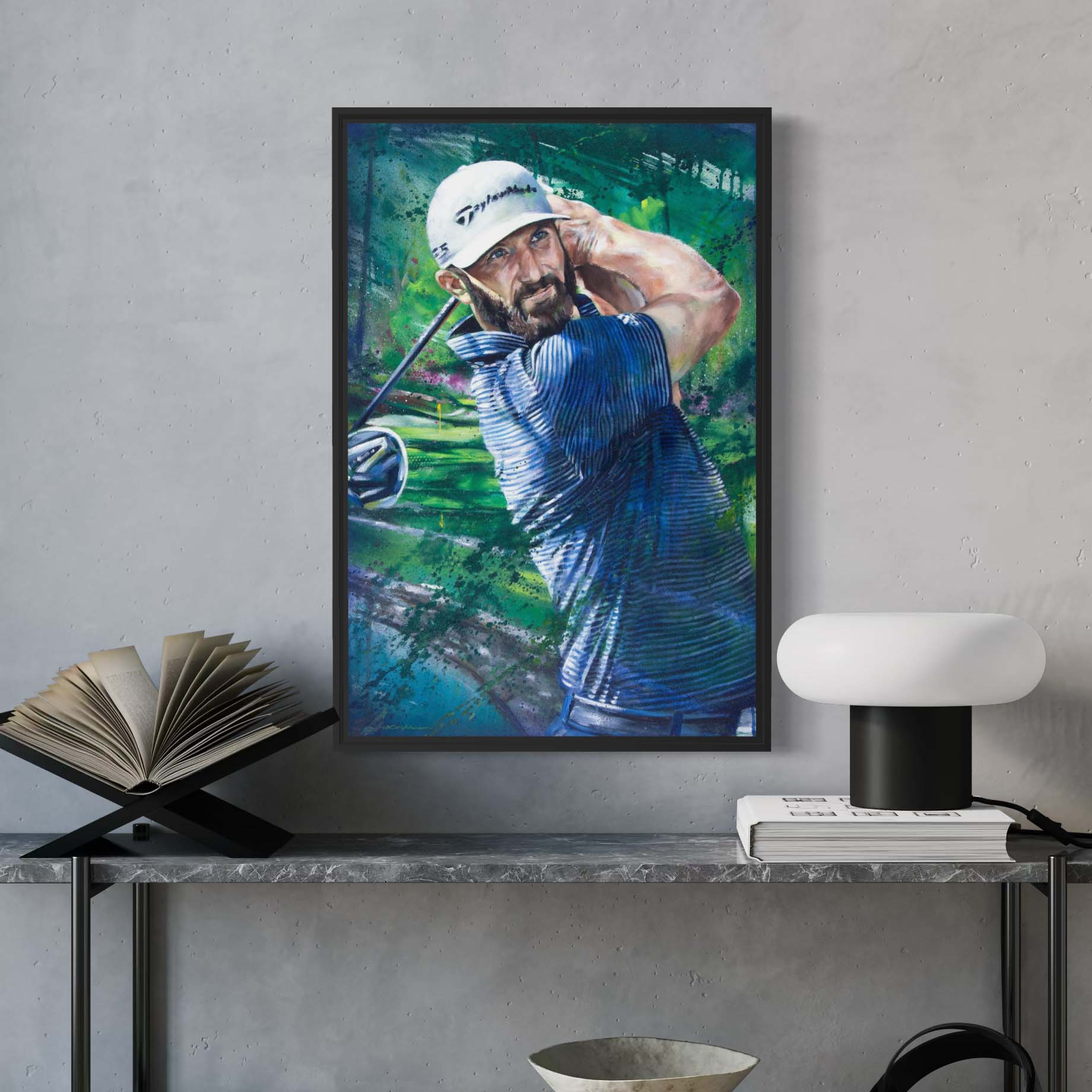 2020 Masters champion Dustin Johnson mid-swing in a white cap by Kyle Lucks on a gallery-wrapped canvas in a black float frame, front view