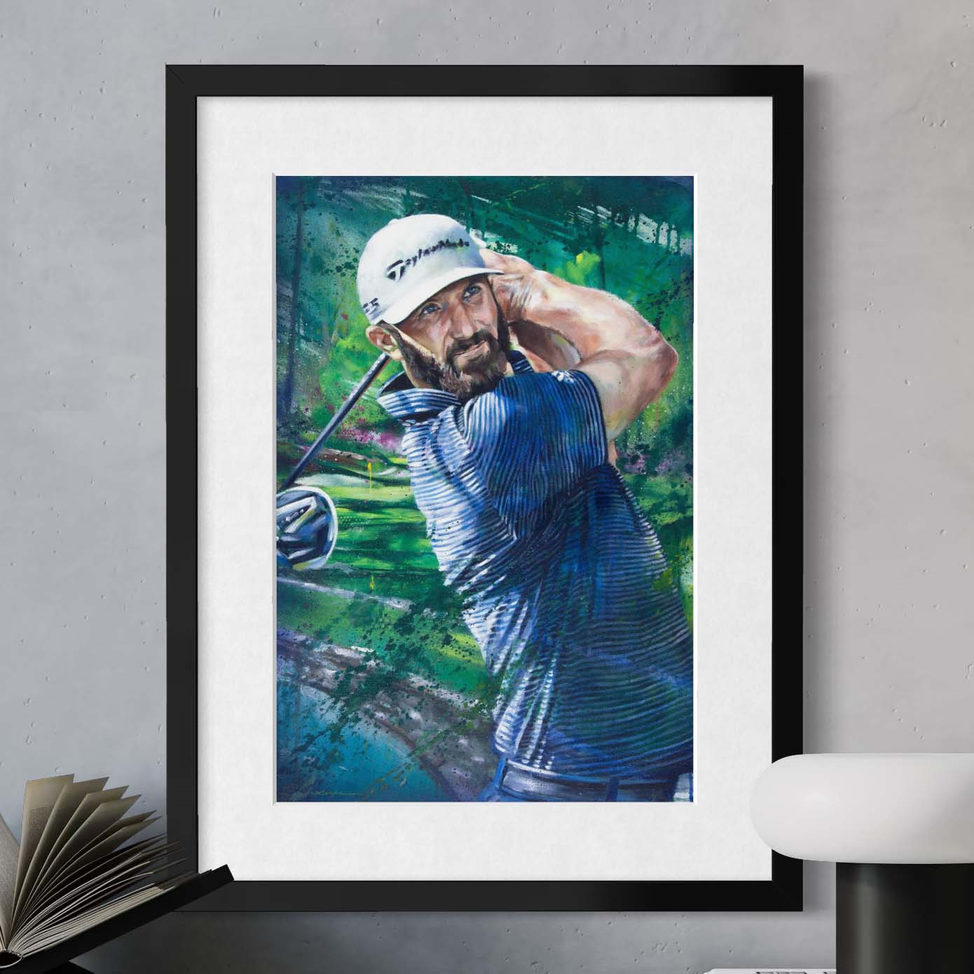 2020 Masters champion Dustin Johnson mid-swing in a white cap by Kyle Lucks as a framed giclée fine art print in a black frame, front view