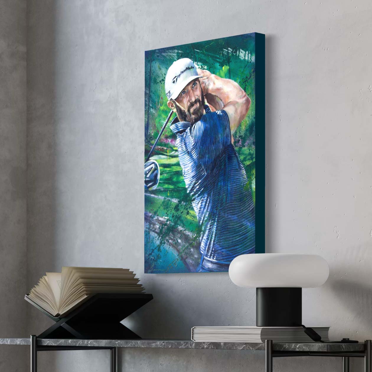 2020 Masters champion Dustin Johnson mid-swing in a white cap by Kyle Lucks on a gallery-wrapped canvas in a black float frame, angle view