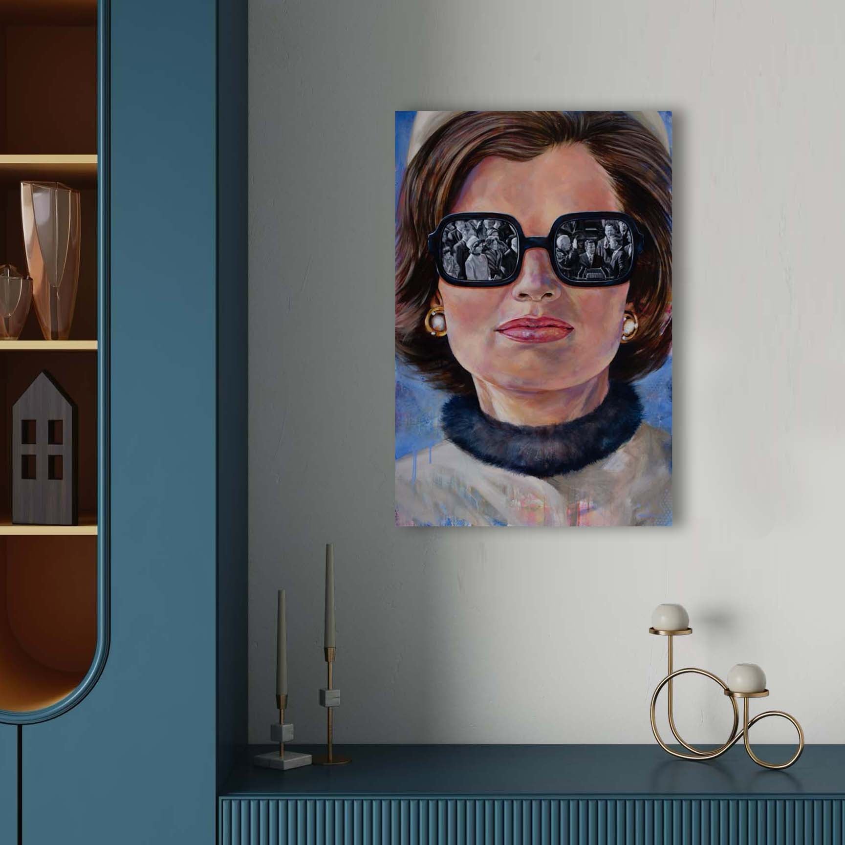 Portrait painting of Jackie Kennedy Onnassis wearing a camel colored pillbox hat and coat, large black rimmed sunglasses showing the reflection of President John F. Kennedy taking the oath of office at his innuaguration.