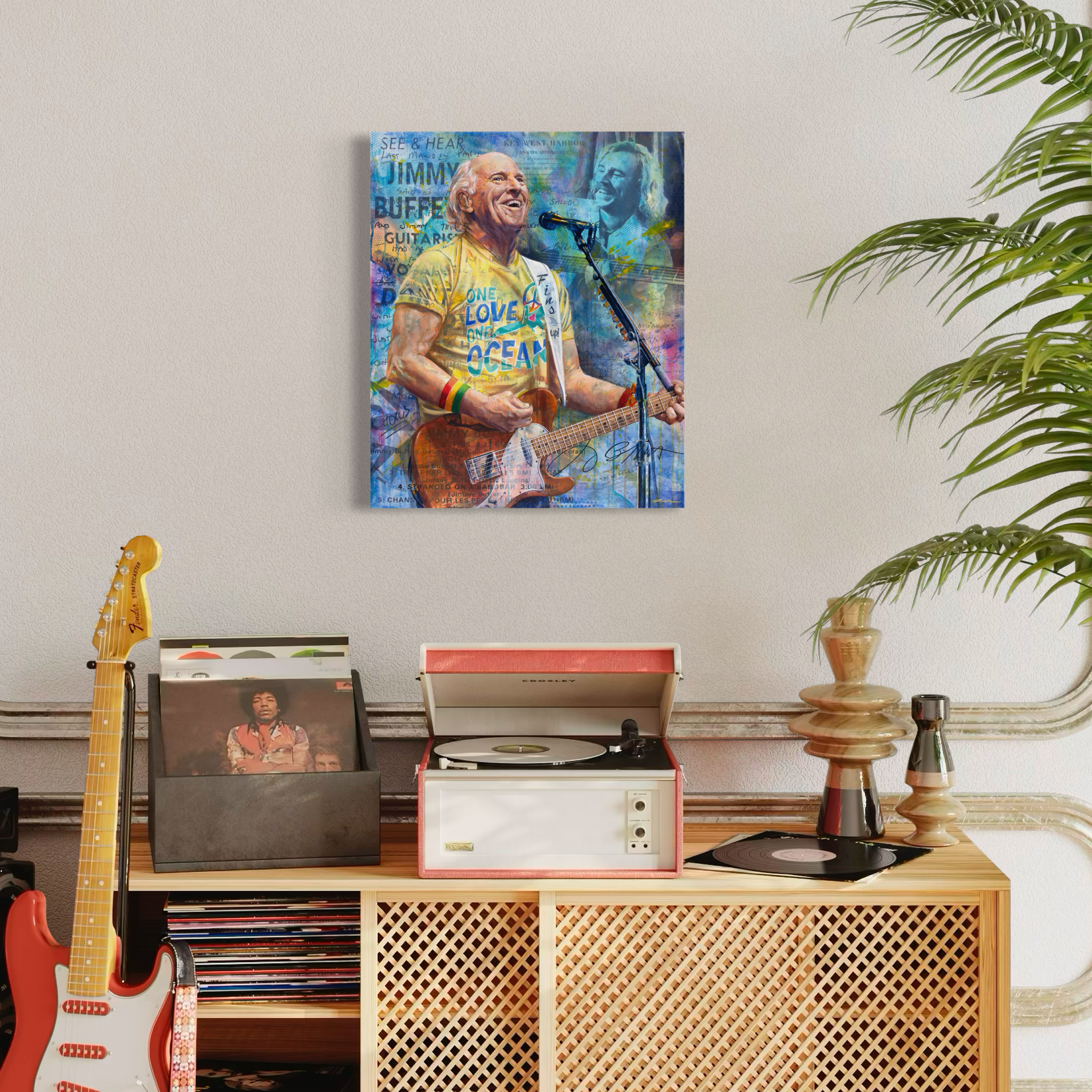 Portrait painting of singer-songwriter Jimmy Buffett playing an orange guitar, wearing a yellow t-shirt and singing into a microphone. Images of Jimmy's handwritten song lyrics in the background. 