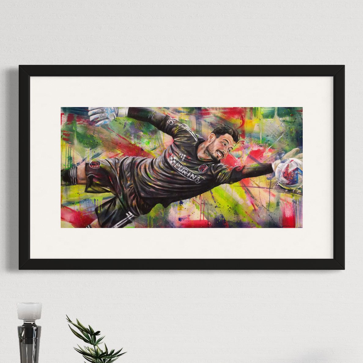 Soccer goalkeeper Roman Bürki by Kyle Lucks as a framed giclée fine art print in a black frame, front view