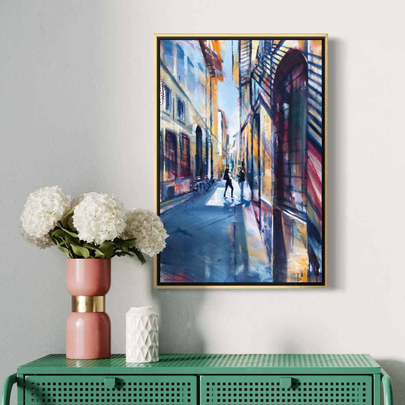 Stylish woman on Florence street by Kyle Lucks on a gallery-wrapped canvas in a gold float frame, front view