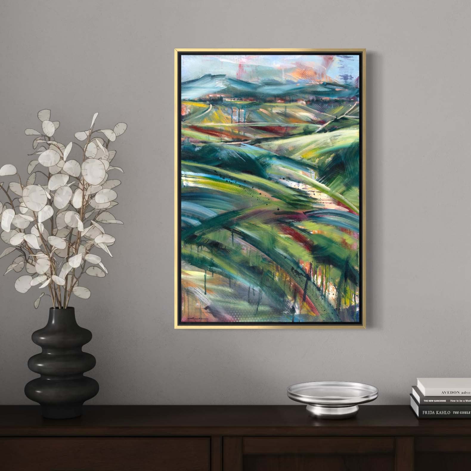 Tuscan countryside in afternoon light by Kyle Lucks on a gallery-wrapped canvas in a gold float frame, front view