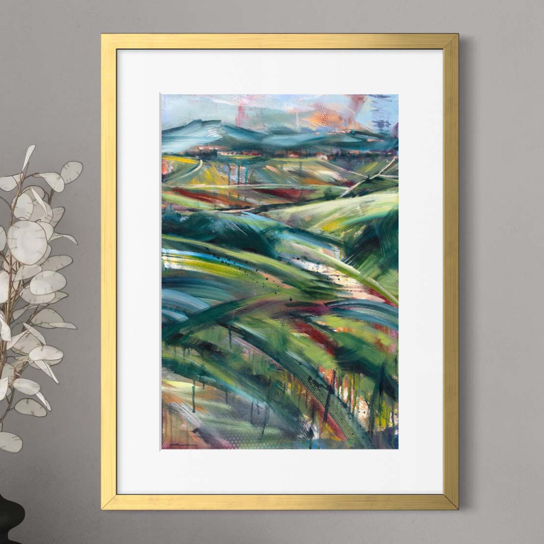 Tuscan countryside in afternoon light by Kyle Lucks as a framed giclée fine art print in a gold frame, front view