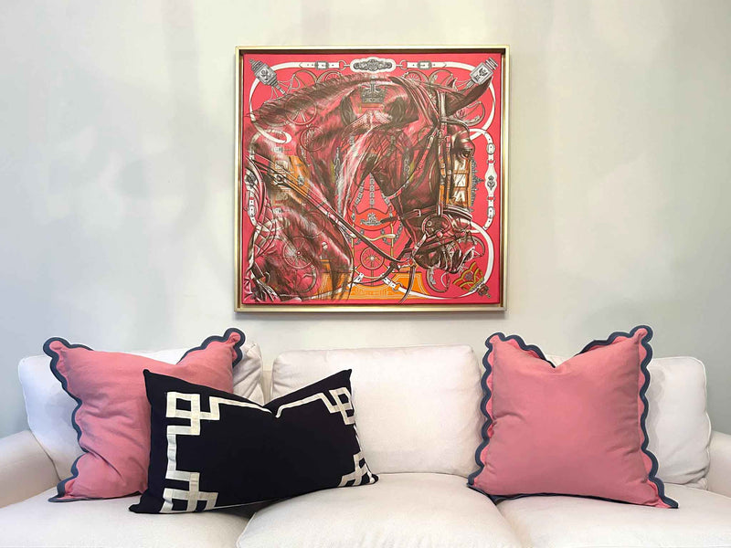 'Majestic Motion' horse portrait on a Hermès silk scarf by Kyle Lucks, framed and displayed above a living room sofa